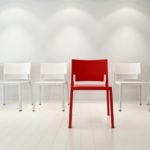 Concept illustration of red and white chairs Extrajudiciales